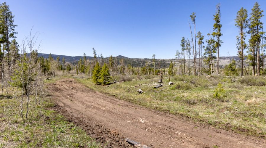 Ground Photo Showing the Dirt Road to the Property for Lot 150 Sky Hitch II At Stagecoach 2